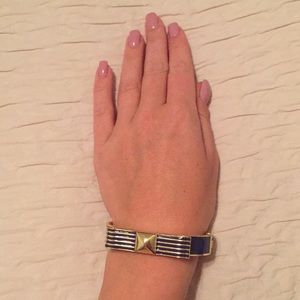 bracelet with hidden message “live in the moment”